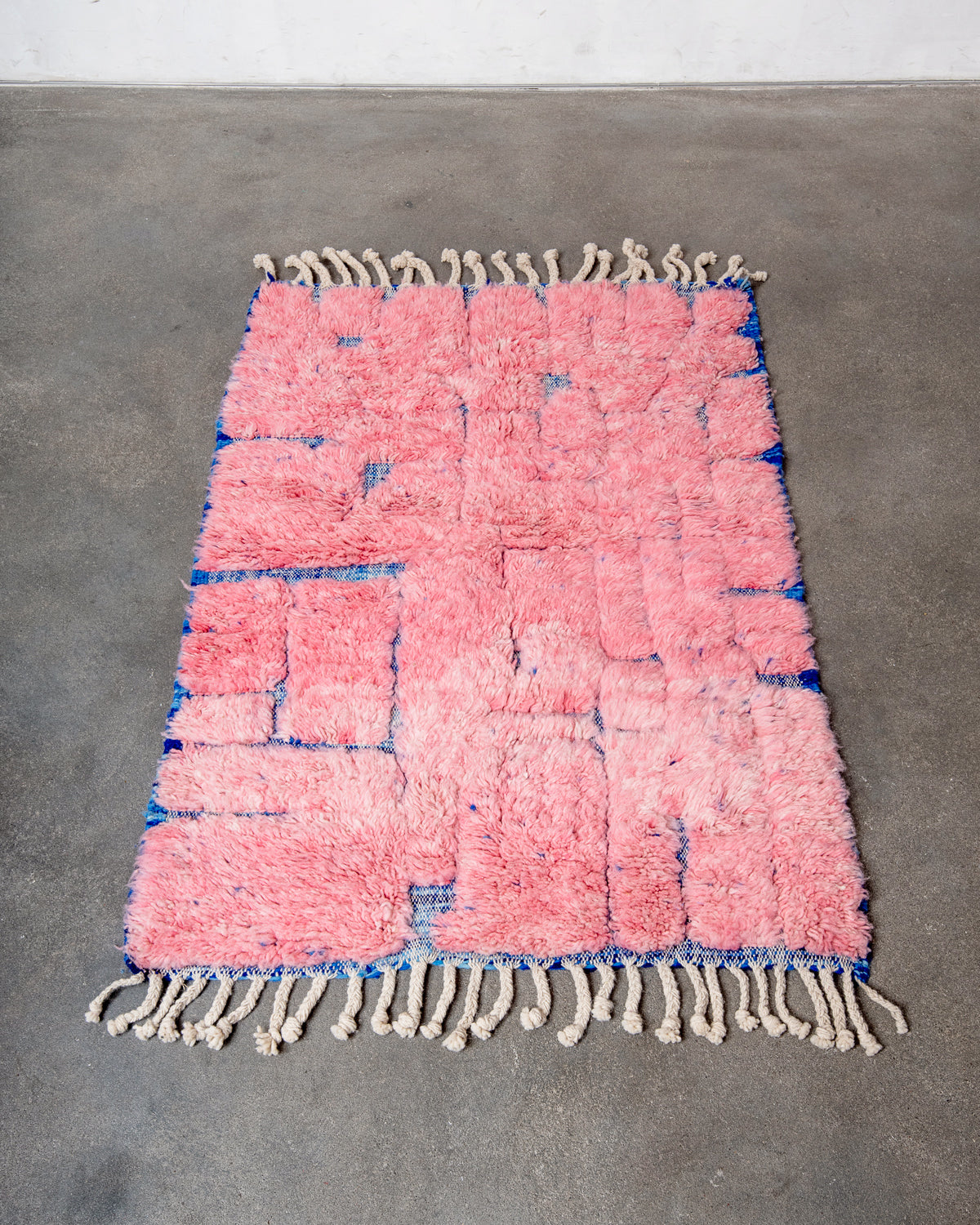 Modern, designer, handcrafted Berber rug from Morocco. Beniourain carpet with beautiful colours and patterns and fluffy wool texture.
